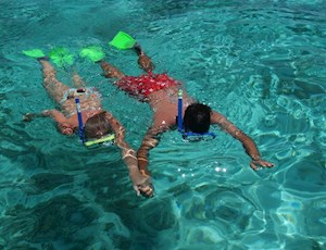 couple-snorkeling-at-reef-world