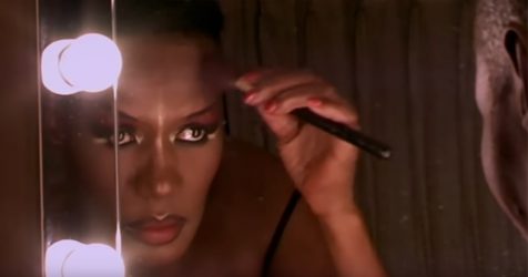 photo of grace jones sitting at her dressing table