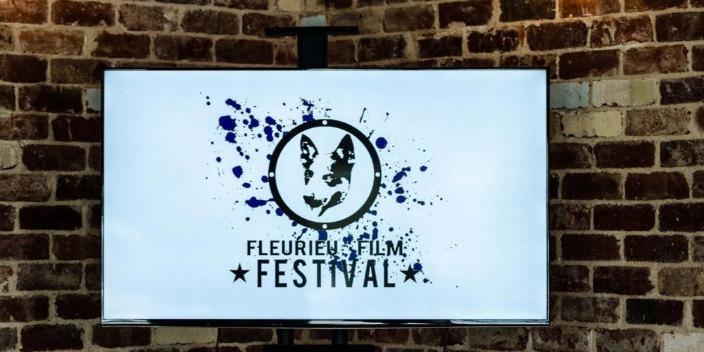 Fleurieu Film Festival poster in front of brick wall