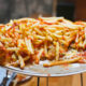 pizza with french fries on top