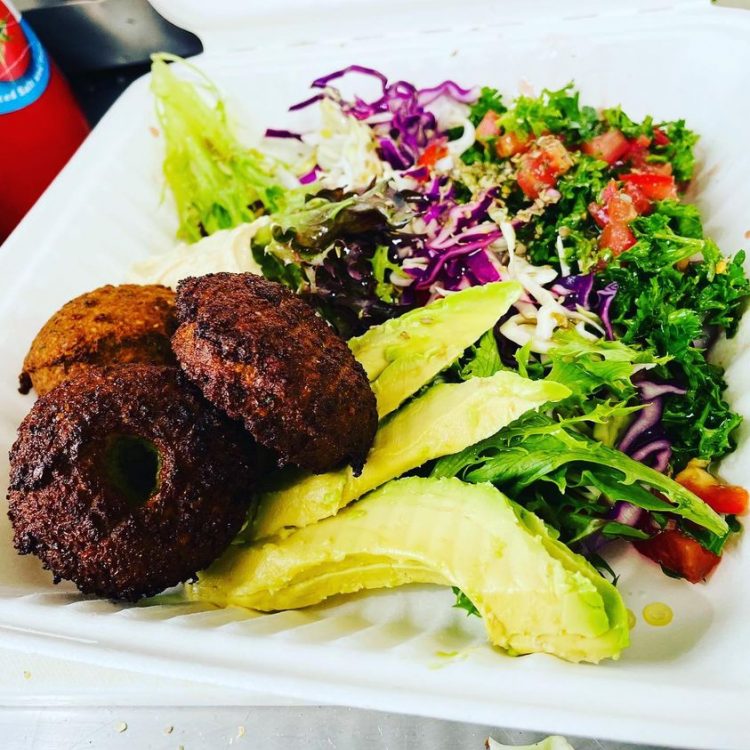 Fresh salad and falafel balls. Yes, it's Vegan, and Gluten-free! - Ayla's Cafe