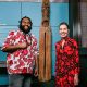 Edgell Junior Edgell and Dr Samantha Hamilton standing either side of a tall carved Vanuatu slit drum